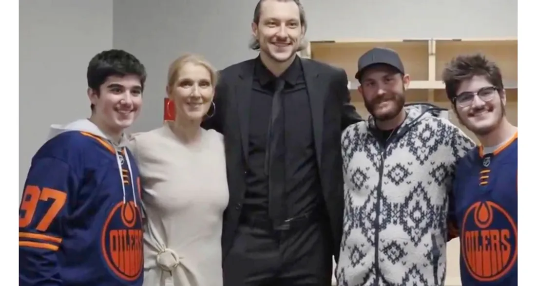 Céline Dion et ses fils aux côtés d'un sportif