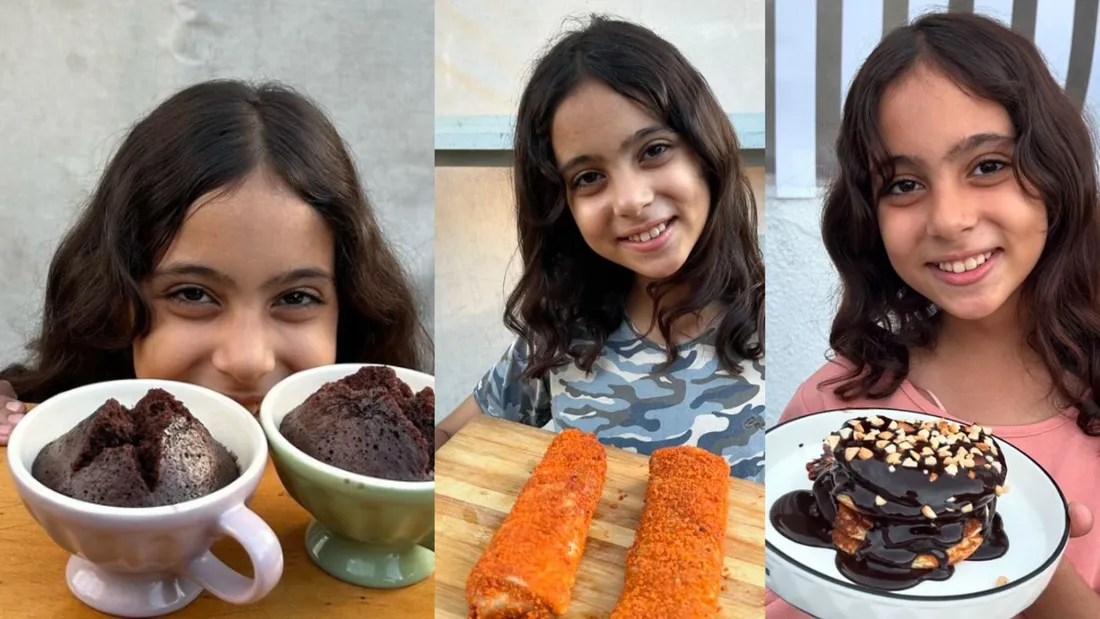 Renad pose avec les plats qu'elle a préparé à partir des colis alimentaires 