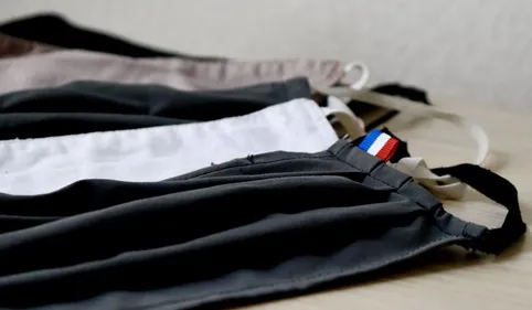 Le masque rendu obligatoire dans les zones à forte densité de...