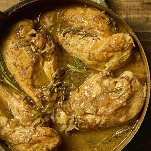 Poulet confit au miel et au romarin