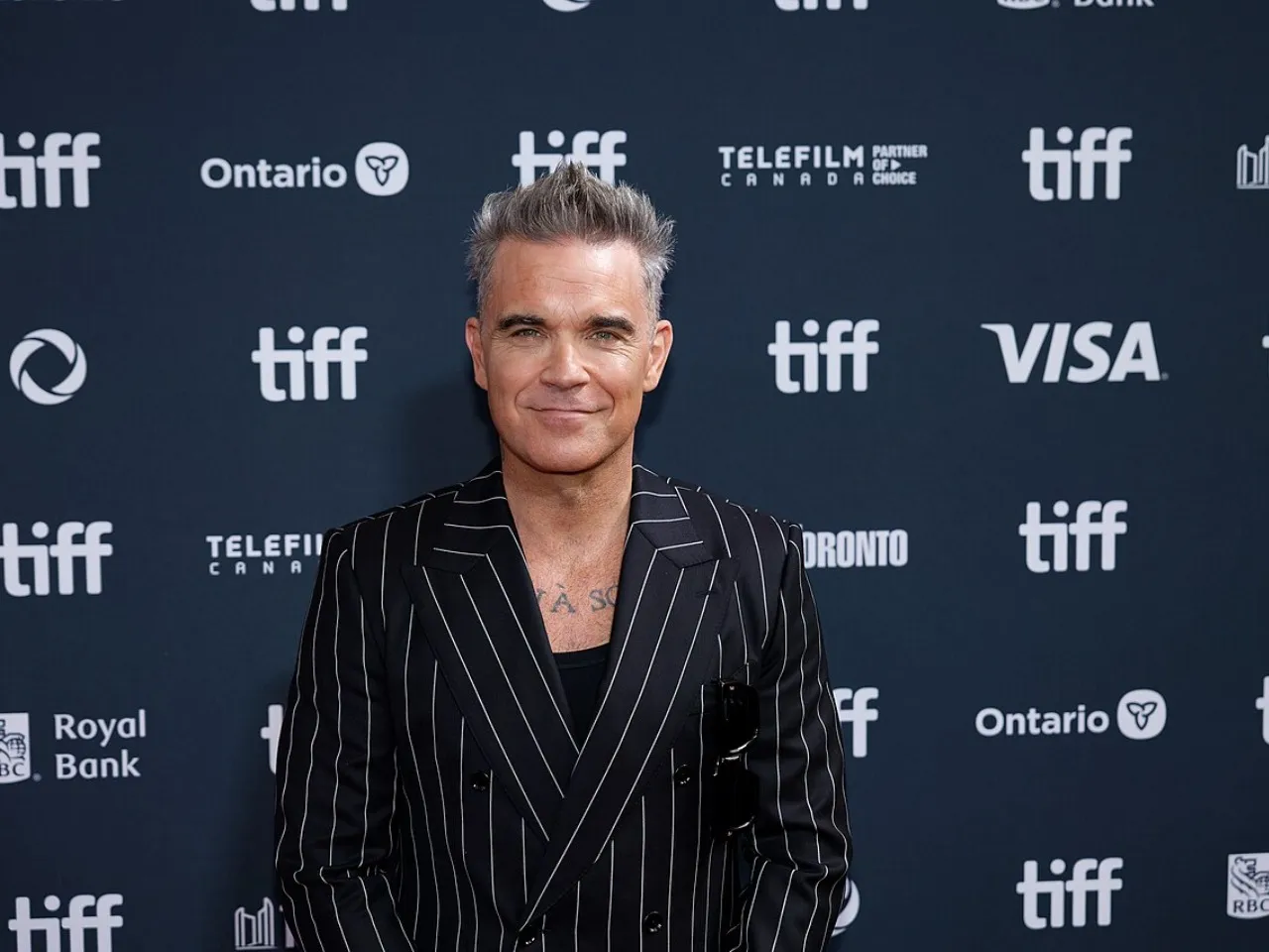 Robbie Williams plus fort que les Beatles grâce à un record historique