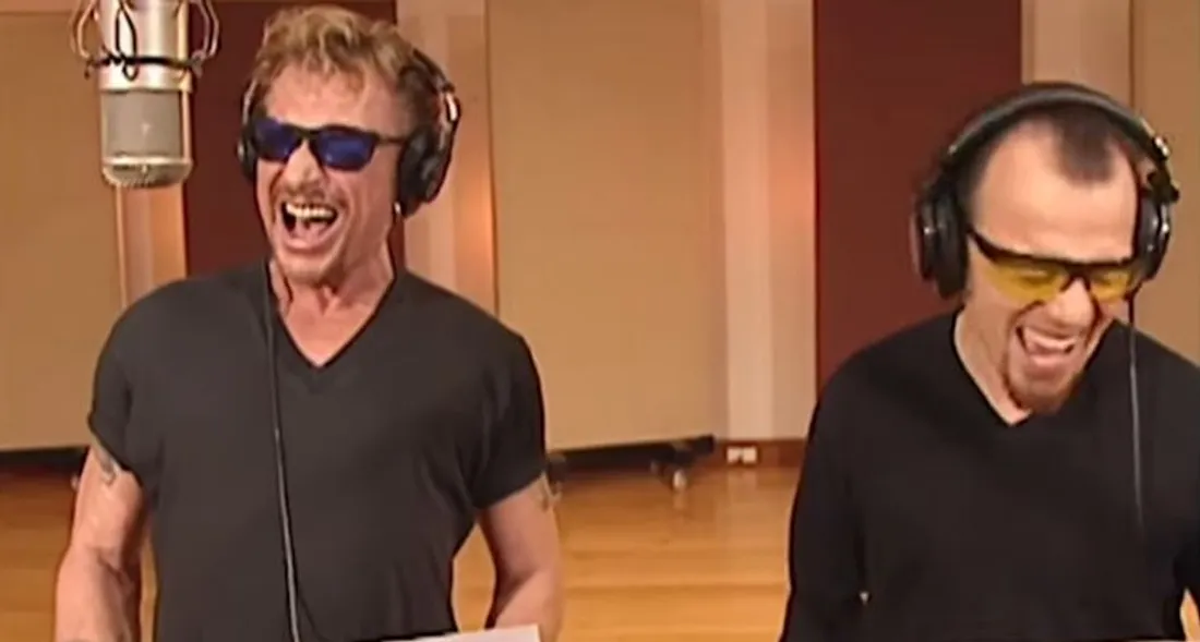 Johnny Hallyday et Pascal Obispo chantent "Allumer le feu"