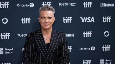 Robbie Williams plus fort que les Beatles grâce à un record historique