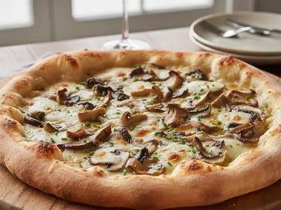 Pizza maison à la truffe et champignons