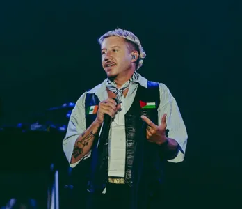 Macklemore écarté de la tournée d’Ed Sheeran après ses prises de...