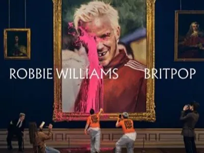 Robbie Williams rend hommage à l'âge d'or de la musique britannique...