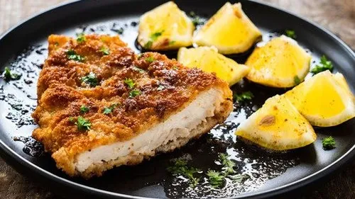 Escalope viennoise avec curry et coriandre