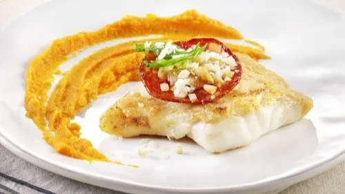 Pavé de merlu et son crumble amande parmesan