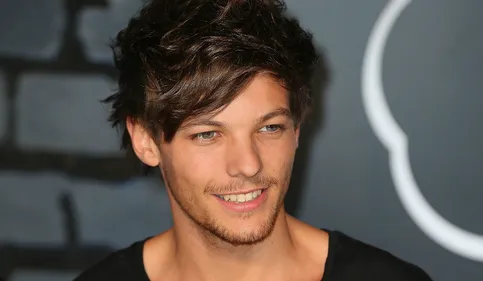 Un chanteur de One Direction achète un club de foot