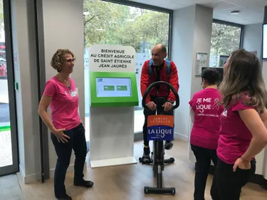 Aller à la banque et pédaler pour la Ligue contre le cancer de la...
