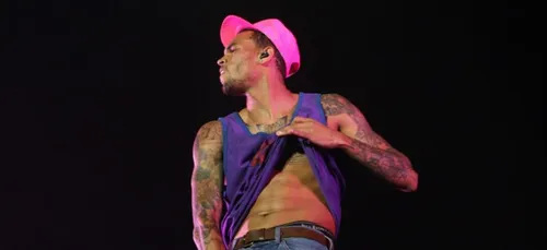 Eminem et Chris Brown bientôt retirés d’un site de musique en...