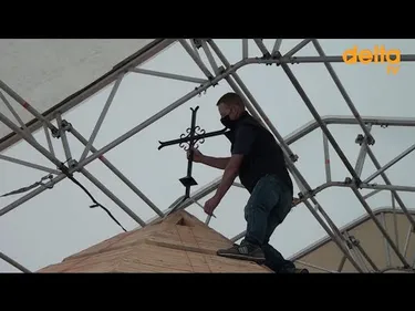 Bénédiction de la croix en abside de l'église de Watten