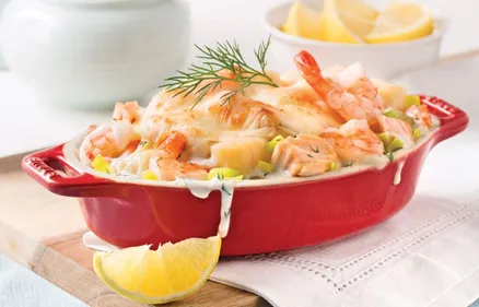 Gratin de poireaux, saumon et crevettes
