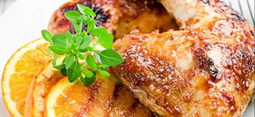 Cuisses de poulet rôties à l'orange