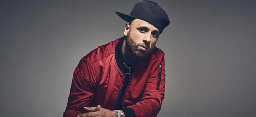 Nicky Jam improvise une chorégraphie dans un restaurant avec Will...