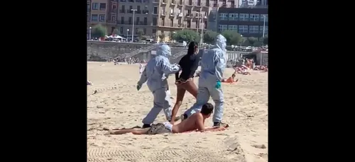 Une femme positive au Covid-19 arrêtée sur la plage en Espagne (vidéo)