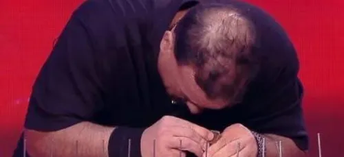 Enfin, le record du monde de planté de clou avec le front a été...