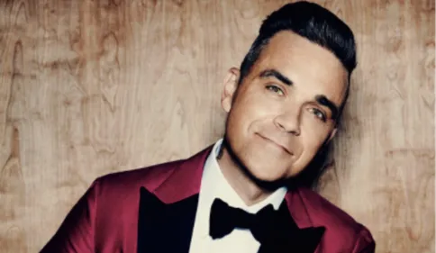 Robbie Williams malade : il annonce une mauvaise nouvelle ! (VIDEO)