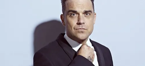 Robbie Williams est tout nu sur la pochette de son nouvel album !