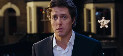 « Love Actually » : quand Hugh Grant surprend les londoniens en...