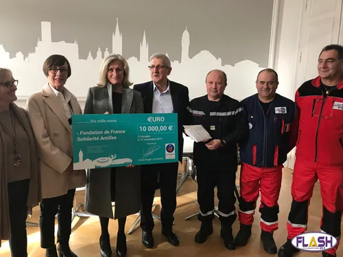 Remise de chèque et de collecte pour la Fondation de France et les PUI