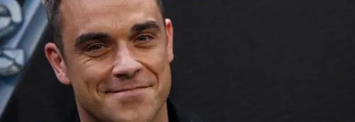 Robbie Williams fait une surprise à une fan !
