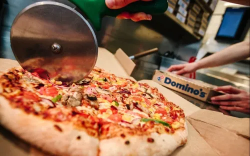 Domino’s va proposer au Royaume-Uni un bouton pour commander une...