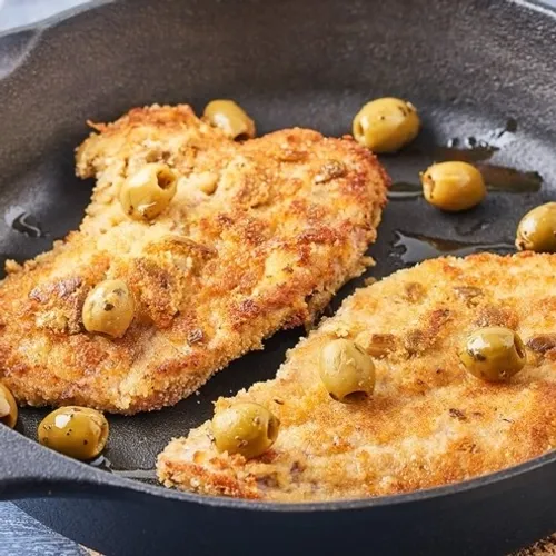 Escalope de veau pannée au parmesan et olives