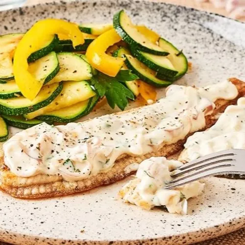 Filet de poisson, courgettes et sauce citronnée