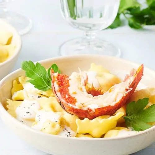 Raviolis et queue de homard aux herbes