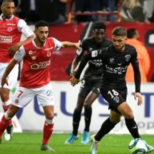 [FOOTBALL]: Nîmes accroche Reims et ramène le point du match nul...